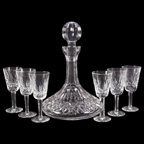 659 - A Waterford Crystal Lismore pattern ship's decanter and stopper, 26cm, boxed, and 6 matching Sherry/... 