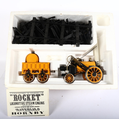 677 - Hornby Stephensons Rocket, boxed, and 3 boxes of track