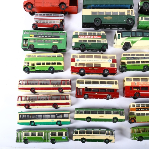 678 - A large quantity of diecast buses, including Corgi