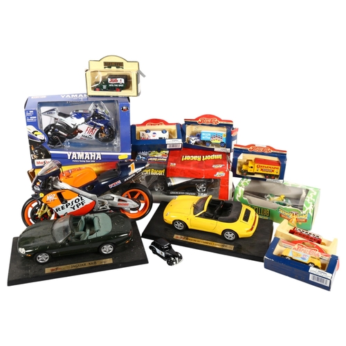 679 - Boxed toy Yamaha motorcycle, boxed cars including Option, etc