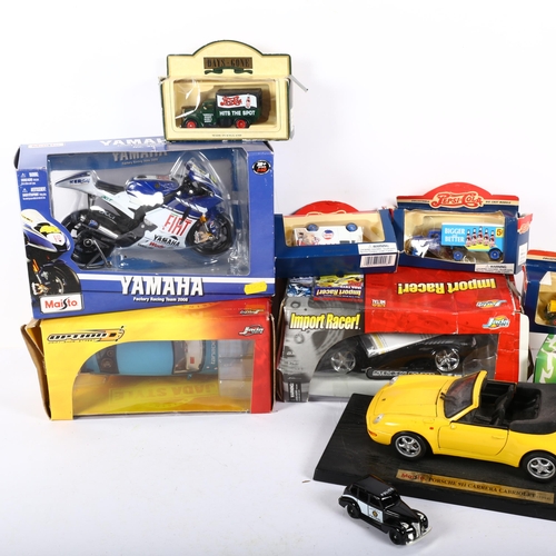 679 - Boxed toy Yamaha motorcycle, boxed cars including Option, etc