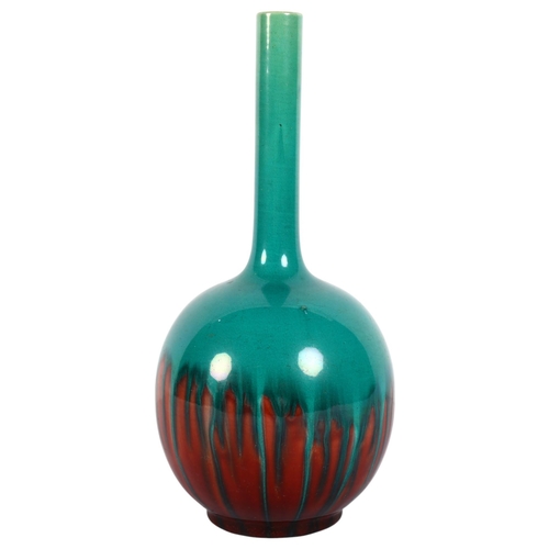 682 - A Burmantofts green and red glazed bottle vase, marked to base 