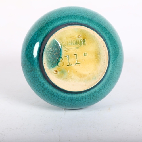 697 - A Linthorpe turquoise glazed vase, maker's stamp to base, ref. 811, H7cm, from the estate of a forme... 