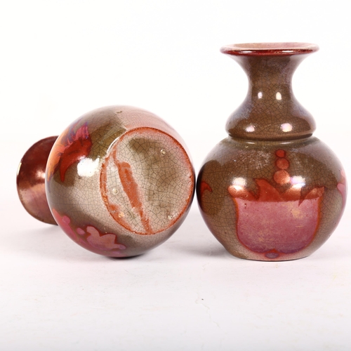 703 - A pair of Art pottery ruby lustre vases, unmarked, each height 8.5cm (2), from the estate of a forme... 