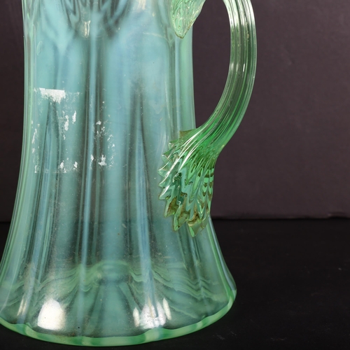 709 - An Art Nouveau vaseline glass jug, unmarked, possibly Powell Whitefriars, H17.5cm, from the estate o... 