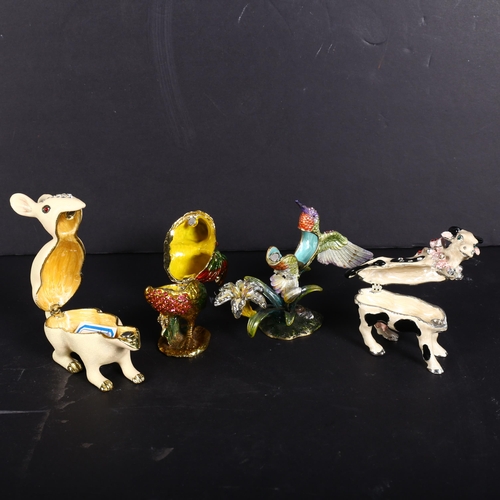 711 - A group of 4 various enamelled and jewelled trinket boxes, various in the form of a hummingbird, cow... 