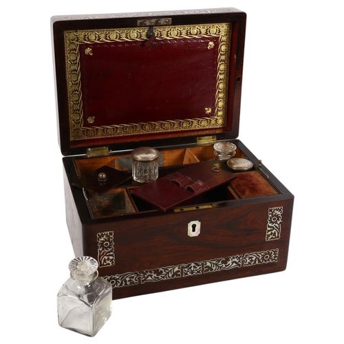 773 - An Antique rosewood and mother-of-pearl inlaid travelling writing/stationery box, with associated co... 