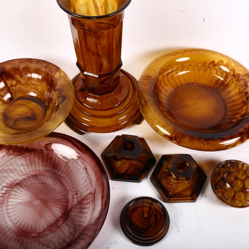 775 - A collection of amber clouded glass items, many Art Deco in design, including various centrepiece bo... 