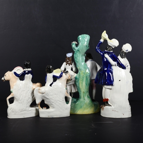 777 - A group of Staffordshire ceramic figures, including various figures on horseback, spill vases, etc (... 