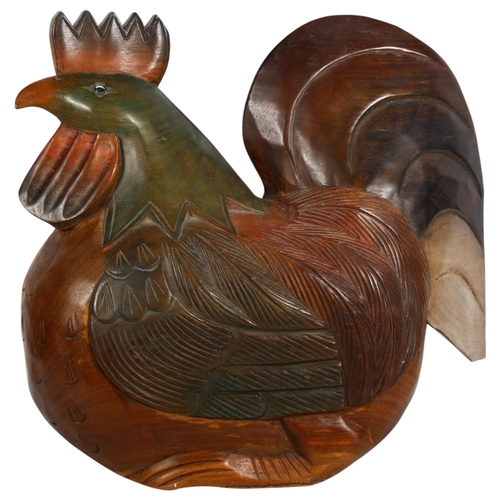 785 - A large carved hardwood sculpture of a rooster, unsigned, H50cm, L54cm, W25cm