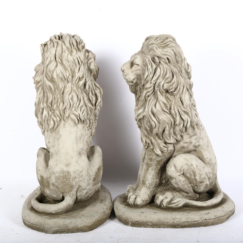 787 - A pair of concrete garden statues, seated Lions, height 40cm.