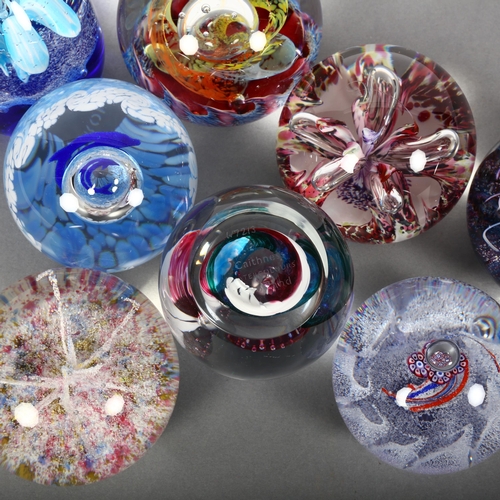 790 - A group of decorative glass paperweights, various designs and styles, the majority marked Caithness ... 