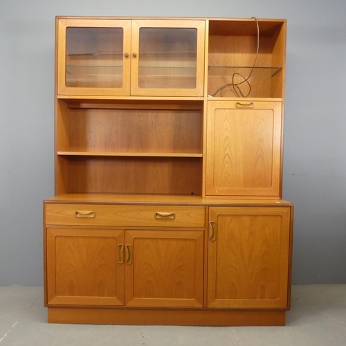 2501 - G-PLAN - A mid-century teak two-section highboard. Width 139cm, height 178cm, depth 45cm.