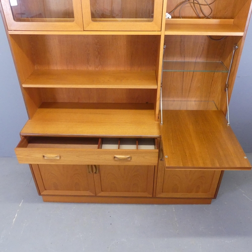 2501 - G-PLAN - A mid-century teak two-section highboard. Width 139cm, height 178cm, depth 45cm.