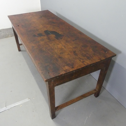 2520 - A stained pine plank-top dining table. Length 188cm, height 76cm, depth 82cm.