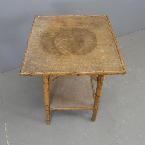 2525 - An early 20th century bamboo two-tier occasional table with rattan top. Width 44cm, height 67cm.