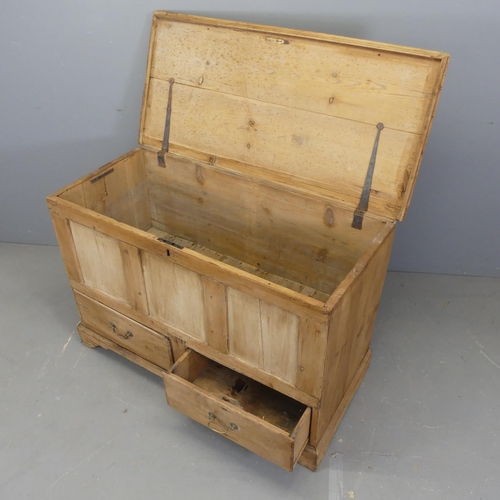 2530 - An antique panelled pint mule chest, with lifting top, two drawers and bracket feet. Width 118cm, he... 