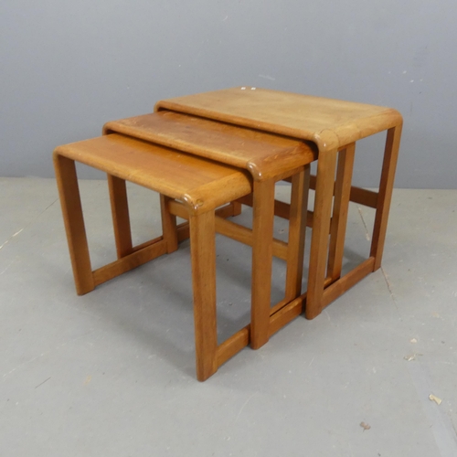 2535 - A mid-century teak nest of three occasional tables, in the manner of O'Donnell Design Ltd. Largest -... 