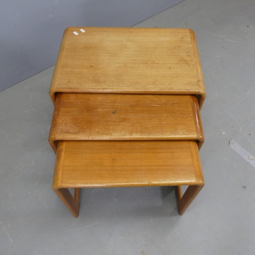 2535 - A mid-century teak nest of three occasional tables, in the manner of O'Donnell Design Ltd. Largest -... 