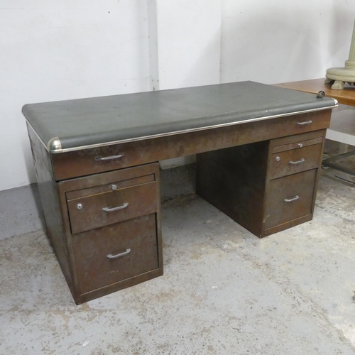 2536 - An industrial metal twin-pedestal desk. Overall width 150cm, height 75cm, depth 75cm, kneehole width... 