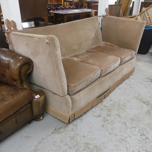 2554 - An antique upholstered two-seater Knole sofa. Overall width 210cm, height 110cm, depth 95cm. Seat wi... 