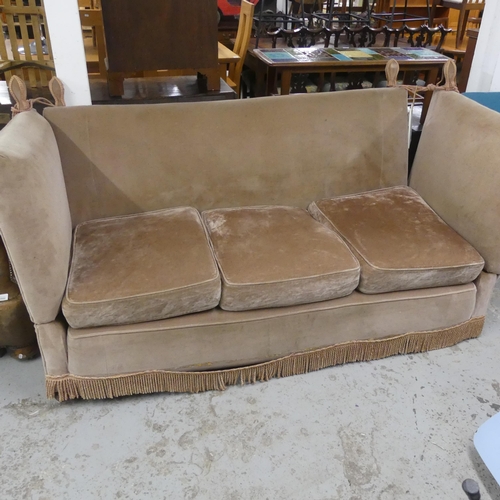 2554 - An antique upholstered two-seater Knole sofa. Overall width 210cm, height 110cm, depth 95cm. Seat wi... 