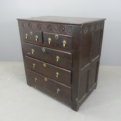 2578 - A 17th century and later oak chest of two short and three long drawers, with carved decoration, bras... 