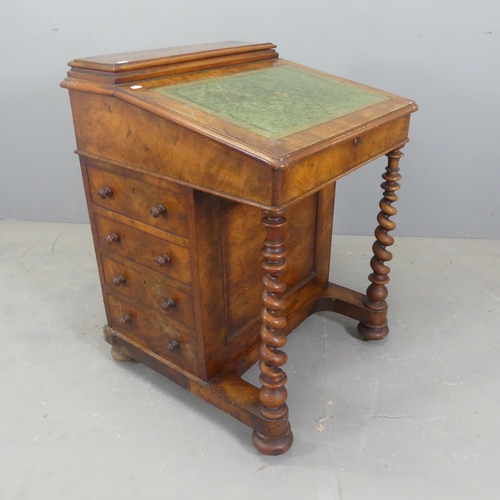 2579 - A Victorian walnut davenport. Width 62cm, height 85cm, depth 62cm.