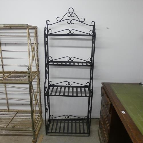 2581 - A modern painted metal four-tier plant rack. Width 60cm, height 165cm, depth 32cm.