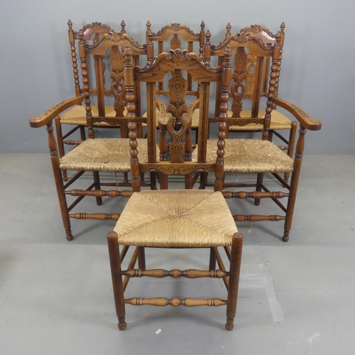 2584 - A set of six early 20th century Dutch oak bobbin turned dining chairs with carved decoration and rus... 