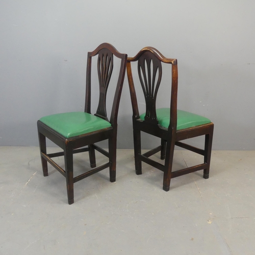 2595 - A set of four country Elm Chippendale style dining chairs reupholstered in green leather with drop-i... 