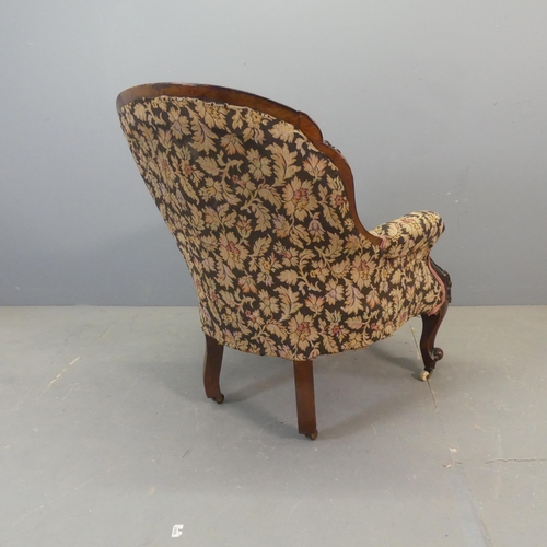 2673 - A Victorian mahogany and upholstered parlour arm chair.