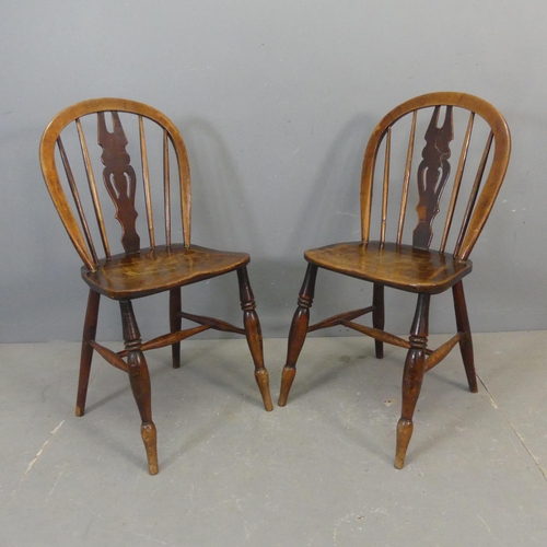 2680 - Two similar 19th century elm-seated stick back side / dining chairs.