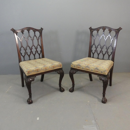 2682 - A pair of late 19th / early 20th century Chippendale style chairs, with lattice backs, cabriole legs... 