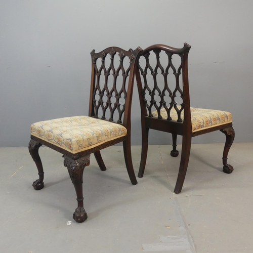 2682 - A pair of late 19th / early 20th century Chippendale style chairs, with lattice backs, cabriole legs... 