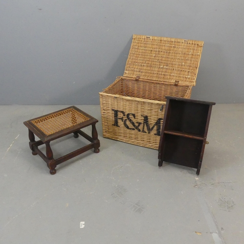 2683 - A Fortnum & Mason's wicker hamper, width 56cm, height 31cm, depth 38cm, a hanging shelf and a cane p... 