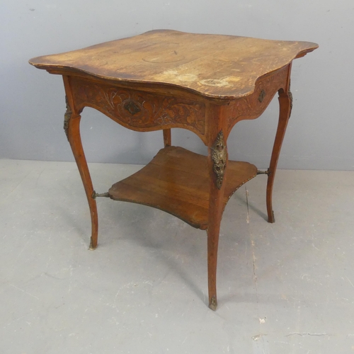 2689 - A French oak two-tier occasional table, with carved decoration and ormolu mounts. Width 72cm, height... 