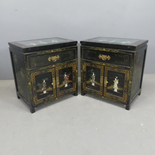 2700 - A pair of Korean black lacquered bedside cabinets, with hardstone and painted decoration. Width 51cm... 