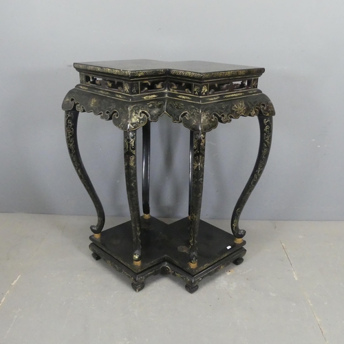 2701 - A Chinese black lacquered double jardinière stand, with painted decoration. Maximum dimensions (on t... 