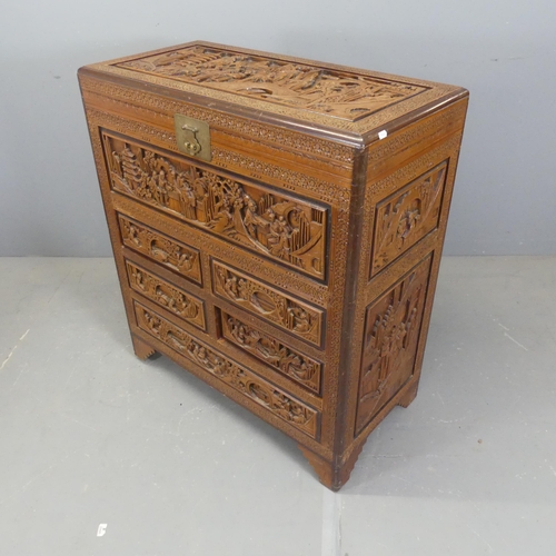 2705 - A Chinese camphorwood dressing chest, with lifting lid, four short and one long drawer, all-over car... 