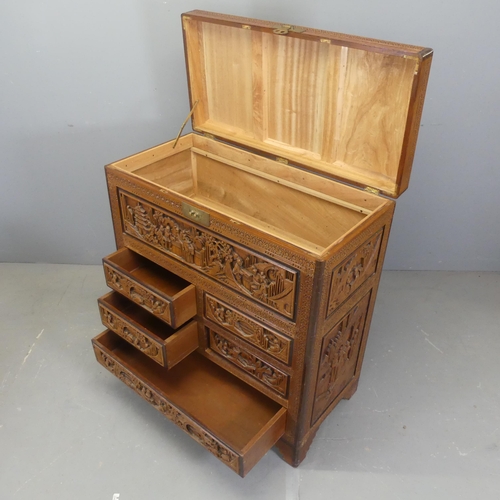 2705 - A Chinese camphorwood dressing chest, with lifting lid, four short and one long drawer, all-over car... 