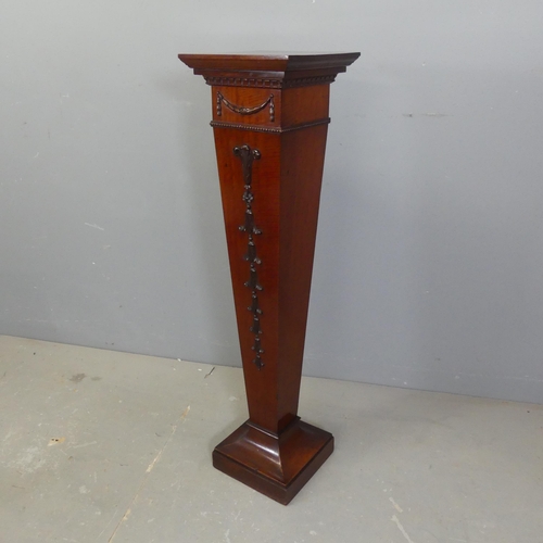 2711 - An Edwardian mahogany jardinière stand with applied carved decoration. Width 25cm, height 91cm.