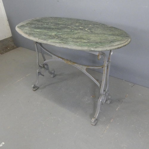 2714 - An oval green-marble topped garden table on painted cast iron base. Length 107cm, height 74cm, depth... 