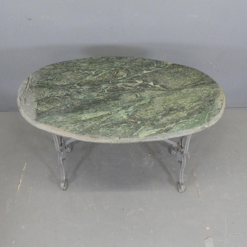 2714 - An oval green-marble topped garden table on painted cast iron base. Length 107cm, height 74cm, depth... 