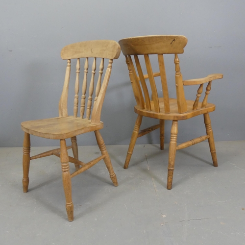 2717 - A pair of pine stick-back elbow chairs, and a similar dining chair. (3)