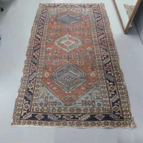 2304 - A cream ground Persian rug. Length 178cm, width 100cm.