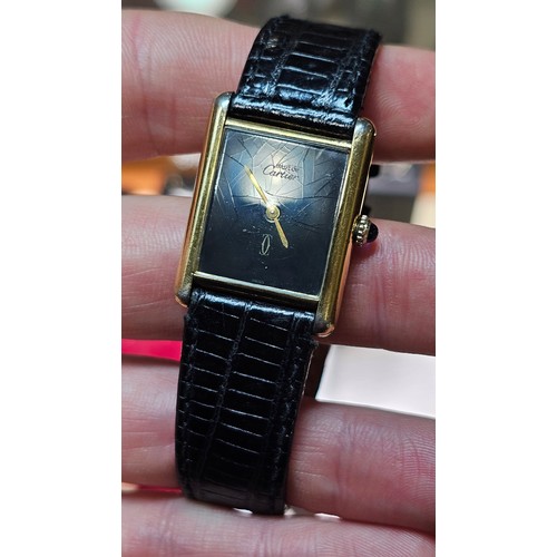 1007 - MUST DE CARTIER - a Vintage sterling silver-gilt Tank mechanical wristwatch, circa 1978, blue dial w... 