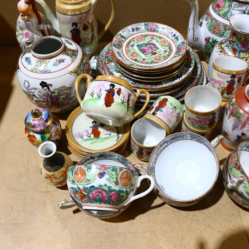 804 - A quantity of modern ceramic Japanese teaware and other items, various teapots, vases, side plates a... 