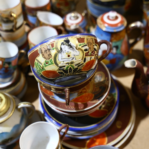 805 - A large quantity of modern Japanese ceramic teaware, various teapots, side plates, saucers and cups,... 