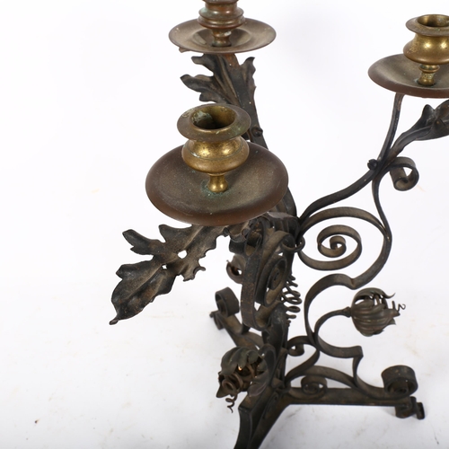 809 - A late Victorian Arts and Crafts 3-branch candelabrum in wrought-iron and brass, in the manner of W ... 